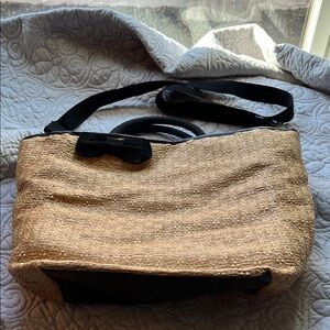 Chic Tan Woven Shoulder Bag with Black Details